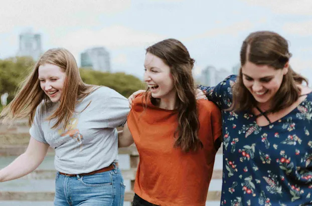 Three young woman having fun
